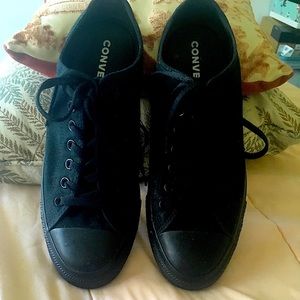 Classic black on black converse sneakers.Gently used.